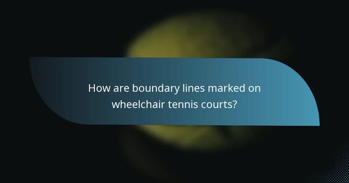 How are boundary lines marked on wheelchair tennis courts?